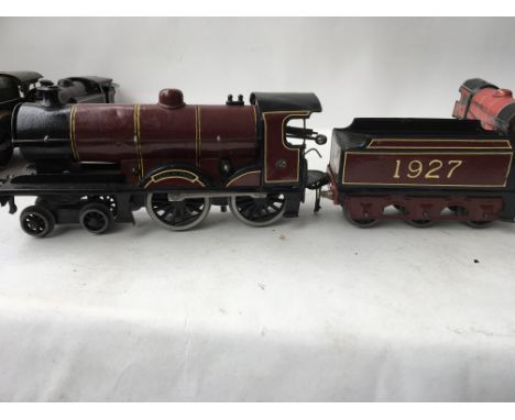 A Bassett-Lowke tinplate Duke of York , clockwork engine and tender numbered 1927 in a maroon colour