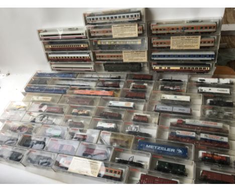 A large collection of boxed Fleischmann Trains , carriages and rolling stock , approximately 65 pcs