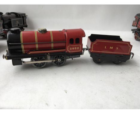 Chad valley tinplate clockwork engine and tender numbered 3402 LMS in red