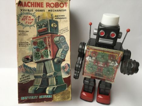 A Japanese boxed, tinplate, Battery operates , Machine Robot with visible gears and mechanism