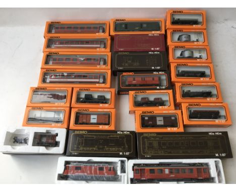 A collection of Bemo boxed 1/87 scale H0e-H0m including, electric rail car locomotive with carriages and rolling stock