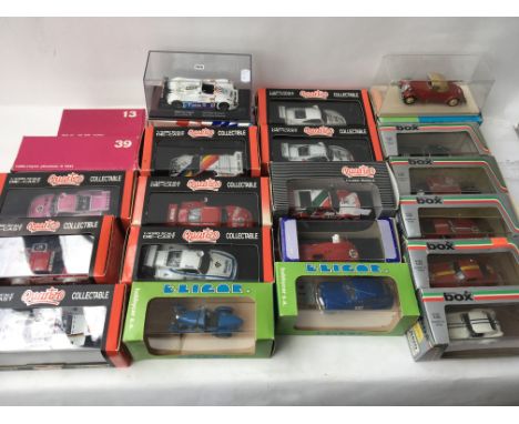 A collection of boxed diecast and in Perspex display boxes including Quartzo, Eligor and Model box etc
