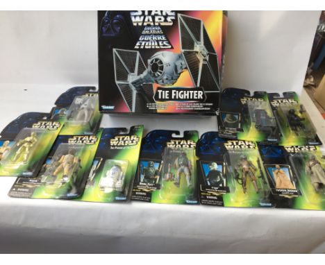 A collection of carded Power of the force Star Wars figures also a boxed Kenner Tie fighter