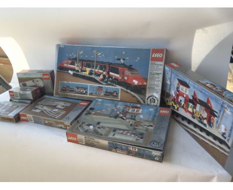 Lego boxed electric inter-city train set 7745 also included is Lego Railway station 7824, Remote controlled level crossing 78