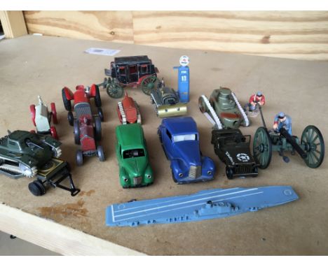 A collection of mainly die cast including Minic tractor, a Crescent Stage coach , Britainâ€™s Cannon, 2 Plastic Minic clockwo