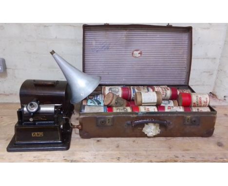 A Thomas A Edison Gem phonograph player, model G151320 together with a vintage case containing Edison phonograph rolls.  