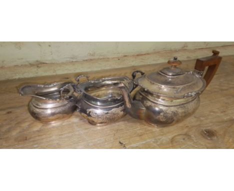 A three pieces hallmarked silver tea service, gross weight 19ozt.  