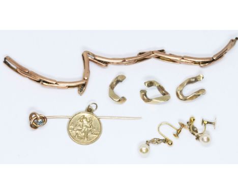 A mixed lot comprising a watch strap marked '9ct', thre chain links unmarked, a hallmarked 9ct gold St Christopher pendant, a