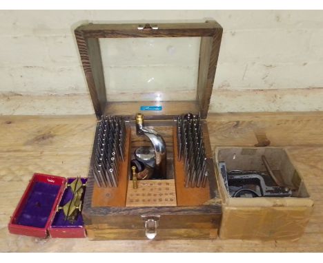 A watch maker's Presista staking set and other tools.  