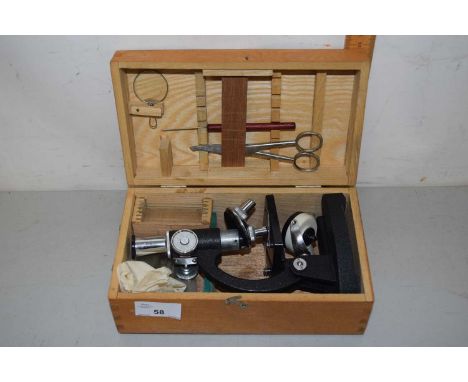A cased students microscope