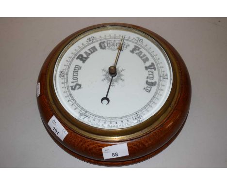A wall mounted barometer