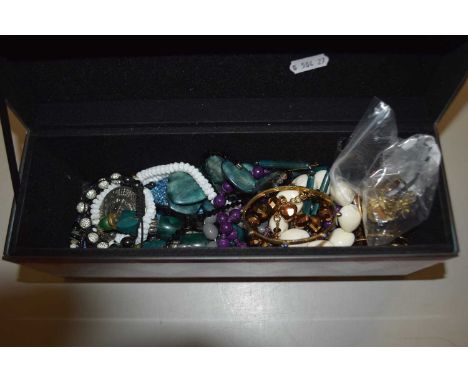 A box of assorted costume jewellery to include bead necklaces, bangles, white metal compact mirror etc