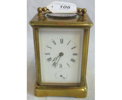 A 19th century brass and four glass carriage clock.