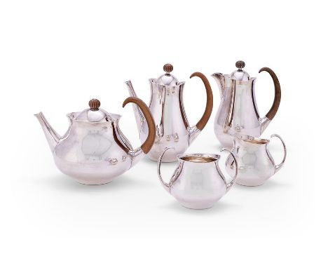 A modern designer silver five-piece matching tea and coffee set designed by Eric Clements for Mappin & Webb and Elkington & C