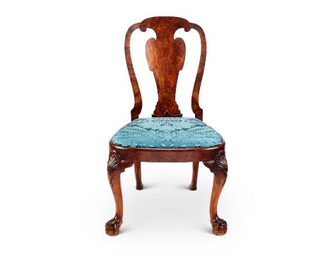 A George II carved walnut side chair in the manner of Giles Grendey&nbsp;
The shaped back above a vase shaped splat and bowed