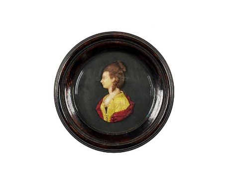 An 18th century coloured wax relief portrait of Lady Beauchamp, Countess of WarwickWearing a yellow and gold dress with a red