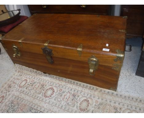 A late 19th / early 20th Century American teak brass bound trunk (locked - no key), 106 cm wide x 57 cm deep x 38 cm high