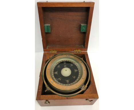 A brass cased ship's compass patent No. 0195A number 8145F-R/COS/ZK with standard gimbal in a teak case 27 cm square x 17 cm 