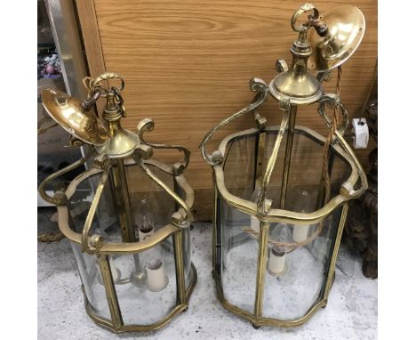 Two 20th Century brass framed ceiling lanterns in the Georgian style 27 cm diameter x 56 cm drop and  26 cm diameter x 47 cm 