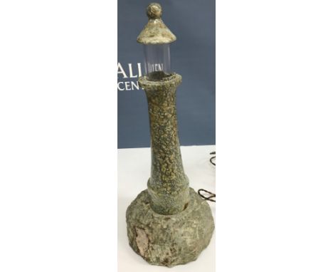 A vintage serpentine Lighthouse table lamp 41 cm high CONDITION REPORTS There are two areas of serpentine missing from the ri