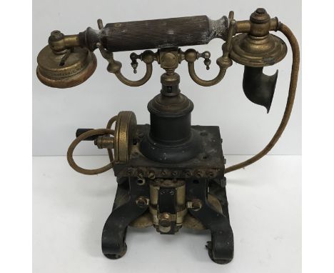 A circa 1910 vintage Ericsson No. 16 skeleton hand crank telephone inscribed "The British LM Ericsson MFG Co Ltd" 29 cm high 