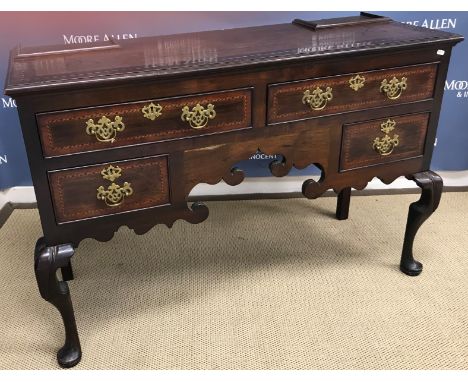 An oak and inlaid dresser in the North Country manner, the top with barber pole stringing (formerly with plate rack) over sim