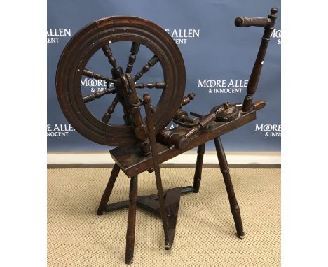 A Victorian fruit wood spinning wheel of typical form, 88 cm long x 86 cm high together with a Victorian brass telescopic oil