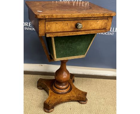 A Victorian burr walnut veneered work table, the top with oval centre medallion over basic fitted drawer with turned horn and