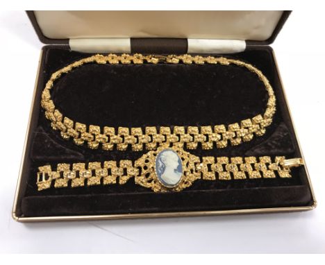 A collection of costume jewellery to include a mid-20th Century gilt metal necklace and matching bracelet with Jasper ware st