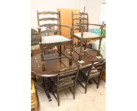 AN OAK DRAW LEAF TABLE TOGETHER WITH SIX LADDER BACK CHAIRS 