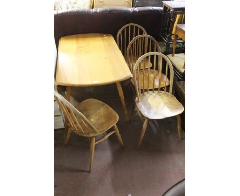 A SET OF FOUR ERCOL DINING ROOM CHAIRS TOGETHER WITH AN ERCOL STYLE DROP LEAF DINING TABLE 