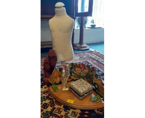 A decorative lot comprising a table top mannequin on treen stand, an oak corner shelf with metallic raised back depicting pai