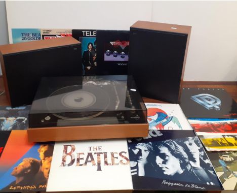 A Bang and Olufsen BeoGram 1500 record player, a pair of Beovox 1001 Type 6246 speakers and various records to include The Po