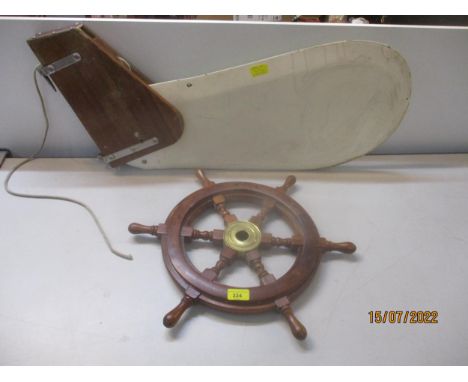 A vintage teak and brass ships wheel and rudderLocation: LWB 