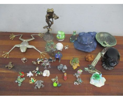 A collection of frog-related items to include a Herend model, silver cufflinks, carved netsuke and other items Location: 