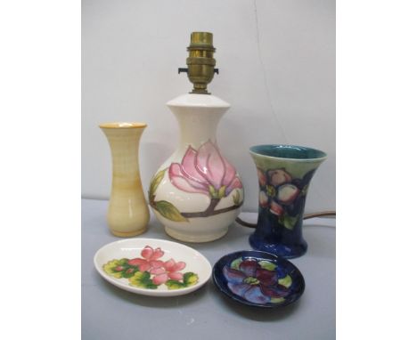 Five pieces of Moorcroft to include a cobalt blue vase, Magnolia table lamp and othersLocation: 