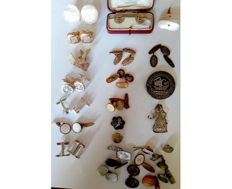Mixed cufflinks to include rolled gold and silver coloured examples together with a mid 20th Century silver Breton Passe broo