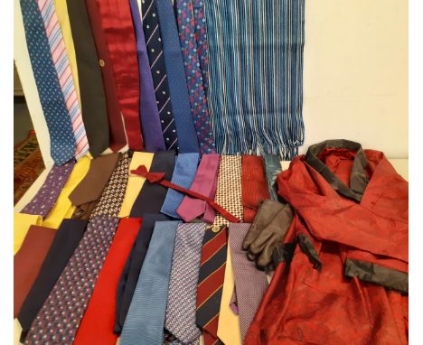 A quantity of gents ties to include silk examples, a striped Winter scarf, leather gloves and a red paisley dressing gown in 