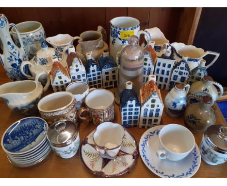 Royal Delft KLM ornamental models of houses, mixed Delft items, decorative coffee cans and saucers and other itemsLocation: R