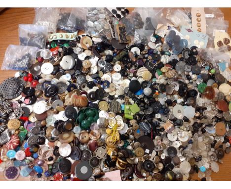 A large quantity of vintage buttons to include 1930's examples, Art Deco black and white buttons, glass and military examples