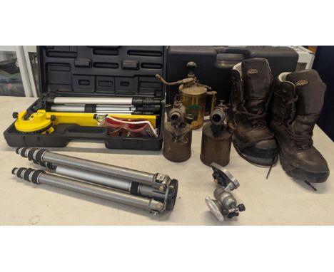 A mixed lot to include two laser level toolkits in carry cases, together with vintage blow torches, tripod and a pair of size
