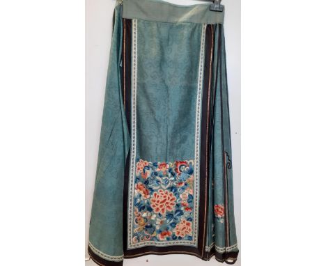 An early 20th Century, late Qing Dynasty, Chinese light-weight blue silk skirt (mamianqun), two panels of elaborately embroid