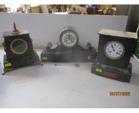 Victorian black slate cased mantel clock with inset malachite medallions, Roman white enamelled dial with exposed balance whe