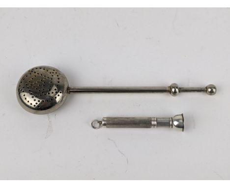 A sterling silver engine turned cigar spike by WM Ltd Birmingham 1952 and a silver plated loose tea infuserLocation: 