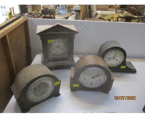 A late 19th/early 20th century mahogany cased mantel clock, the dial with Arabic numerals, marked T C Jones,  Towyn, movement