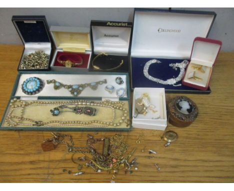 A selection of Victorian and later costume jewellery to include a turquoise inset brooch, together with a brass trinket box i