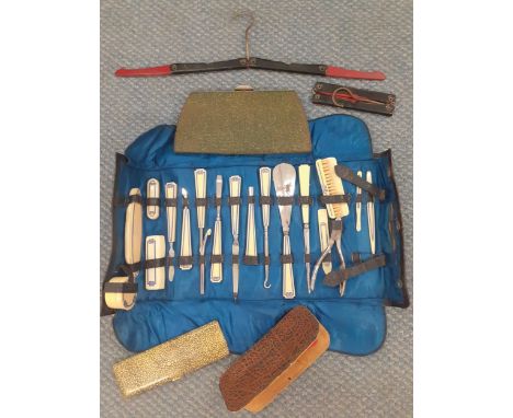 An Art Deco ladies manicure and implement set in a black leather case with blue silk lining together with an Edwardian evenin