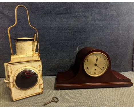 A 1920's mahogany cased mantel clock and a white painted railway lanternLocation: 