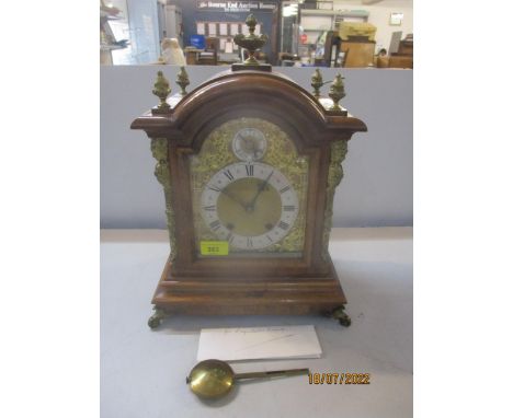 A 19th century German mahogany cased mantel clock, the gilt dial with silvered Roman chapter ring and Fast &amp; Slow dial ab