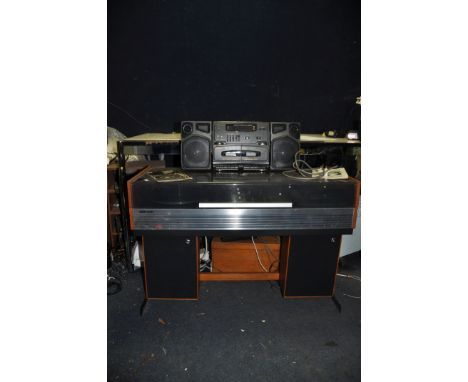 A DECCA DS5347 COMPACT 4 VINTAGE MUSIC CENTRE on stand with two matching speakers (PAT pass and working but stylus needs rewi